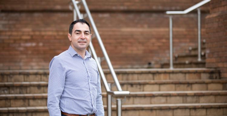 Man standing in front of some steps