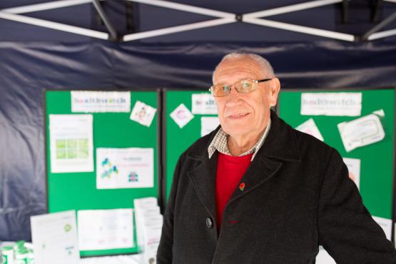 Gentleman standing in front of a Healthwatch display board Gentleman standing in front of a Healthwatch display board