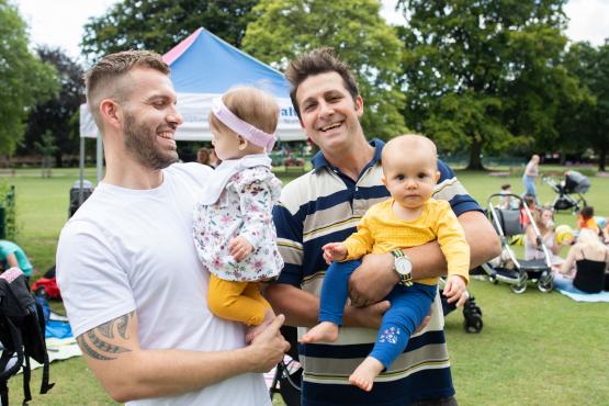 fathers with children at breast feeding picnic fathers with children at breast feeding picnic